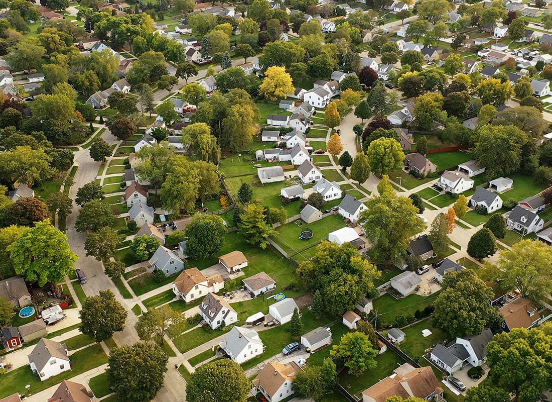 Geneseo, IL - Aerial View of Residential Homes on a Sunny Day